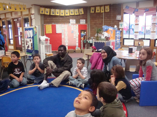 Photo of a YES student from Ghana making a presentation at an elementary school during International Education Week.