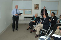 Park National Bank Chairman Michael Kelly describes the financial literacy programs offered at the Community Savings Center.