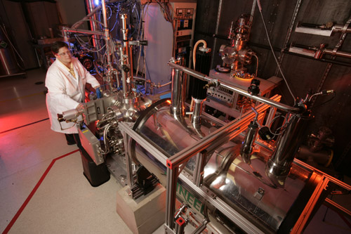 Jill Scott of Idaho National Laboratory with the laser-based optical and chemical imager (LOCI), which was used to identify organic molecules lodged inside terrestrial jarosite samples.