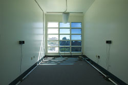 Inside the Windows testbed: the three columns of windows show three levels of transmission (light and solar energy). From left to right, clear, slightly colored, completed colored.