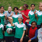 Photo of DC Stoddard Soccer Club and Young Rising Stars players having fun after a scrimmage.