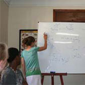 Photo of students practicing Arabic writing