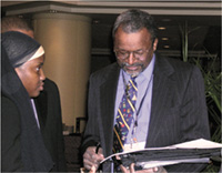 photo of CSAT Director H. Westley Clark and CSAT staff member Rosallah Karim at the HBCU Conference in Washington, DC