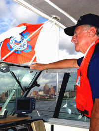 NEW YORK (Aug. 30, 2004) Auxiliarist Vinnie Iannuzzelli provides transportation for Coast Guard personnel during the Republican National Convention. USCG photo by PA3 Kelly Newlin