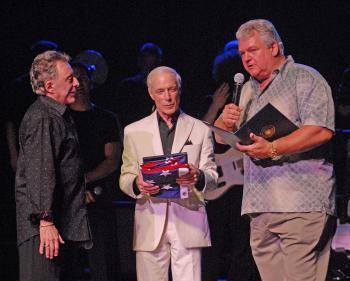 Congressman Brady presents an award to legendary singer Frankie Valli.