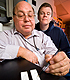 Scientists examining assay plates for botulism. Link to story.