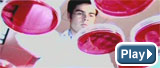 photo of a man with petri dishes