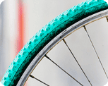 detail of green bike wheel