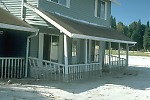 House partially buried by a lahar deposit, Mount St. Helens, Washington