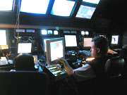 Photo of electrical engineering with video panels and controls for Jason II. (see caption)