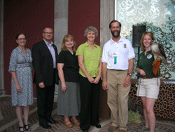 Red-tailed hawk poses with Service, City of Philadelphia, American Ornithologists Union and Philadelphia Zoo representatives. Credit: Alicia King/USFWS
