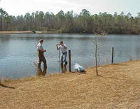 Collecting sediment samples from Crystal Lake, Lexington County, South Carolina.