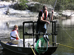 USGS scientists Lia Chaser (left) and Erica Rau (right) study fish in the St. Marys River in northern Florida for analysis of mercury. Credit Mark Brigham/USGS