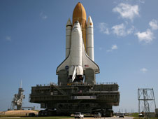 Space shuttle Discovery nears launch pad at the Kennedy Center, Fla., Aug. 4.