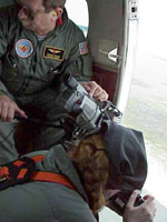 USGS scientists Dennis Krohn and Karen Morgan gather aerial photographs