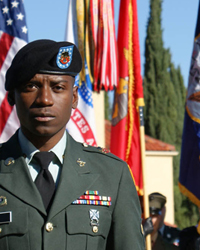 image of military man in front of flags