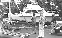 Boat washed onto dock, Keauhou Bay,

    Kona, Hawai`i