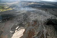  The surge of lava over the past several days has also created a breakout at the top of Royal Gardens subdivision.  Today, the breakout was still active, and was feeding a number of small channelized pāhoehoe flows radiating out from the breakout point.  