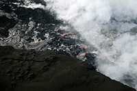  A close-up of several lava streams entering the ocean at Waikupanaha. 