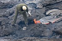 Lava samples, for chemical analyses, are collected nearly each week using little more than a rock hammer and a bucket of water. 