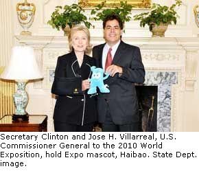 Date: 07/01/2009 Location: Washington, DC Description: Secretary Clinton and Jose H. Villarreal, U.S. Commissioner 
General to the 2010 World Exposition, hold Expo 
mascot, Haibao.  © State Dept Image