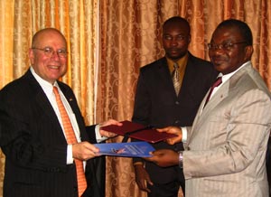 MCCs Jonathan Bloom and Minister of Finance Lucien Marie Noël Bembamba