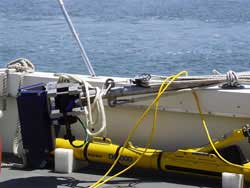 nterferometric sonar system attached to base of sidemount pole, secured on deck during transit