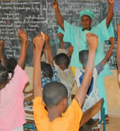 photo teacher leading lesson in Mali classroom