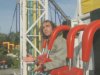 Engineer rides on amusement park ride.