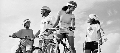 A family taking a bike ride