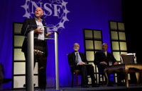 Photo of Craig Venter speaking at JAM luncheon.