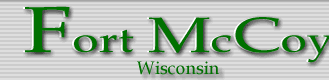 Green Lettering on gray background:  Fort McCoy Wisconsin.  