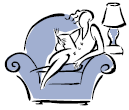 A woman lounging on a chair reading a book.