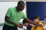 Derron Wallace in a Thai classroom