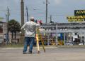 Surveyor working on the street in Galveston, TX