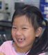 Smiling child missing teeth