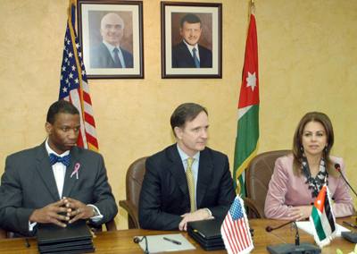 Planning Minister Suhair Al-Ali (right) is seen during a ceremony to sign grant agreements with US Ambassador Stephen Beecroft (centre) and USAID Jordan Mission Director Jay Knott (Petra photo)