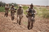 Staff Sgt. William Eddy leads Marines and sailors during a patrol near Fire Base Fiddler's Green.