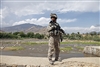 Staff Sgt. Michael Cruz stands along the bank of the Pech River during a patrol.