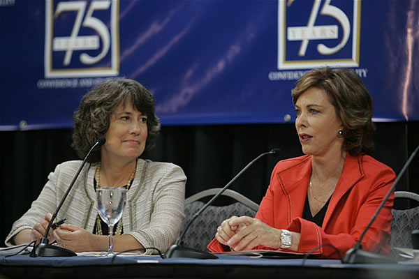FDIC Chairman Sheila Bair listens to panelist Terry Savage respond to a question.