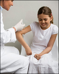 Photo: A girl receiving a vaccination