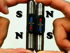Still from video showing magnets