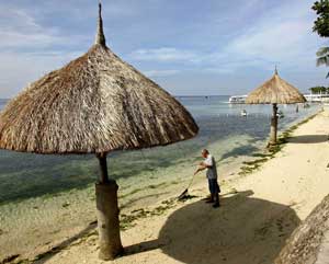 Beach in Cebu Province, Philippines, April 23, 2006. [© AP Images]