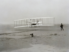 The Wright Flyer at Kitty Hawk.