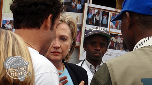 Secretary Clinton briefed by staff at Mugunga Internally Displaced Person Camp, Goma, Aug. 11, 2009.