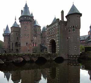 De Haar Castle is reflected in the moat at Haarzuilens, central Netherlands, November 7, 1998. [© AP Images]
