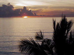 Sunset at Moya beach on Anjouan island, Comoros, December 29, 2001. [© AP Images]