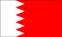 Flag of Bahrain is red with a white serrated band--with five white points--on the hoist side.