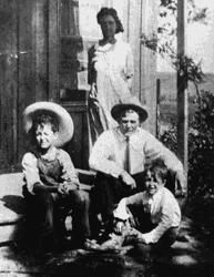 Woody Guthrie, George, Nora on Porch of Okemah Home.