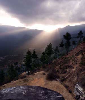 Sunset over hills surrounding Thimphu, Bhutan, March 22, 2001. [© AP Images]